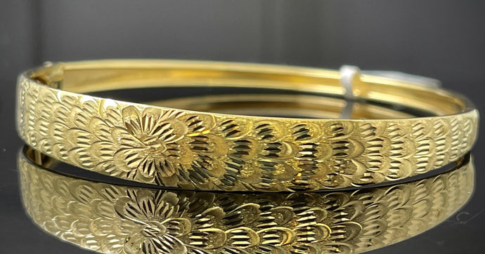 Yellow gold bangles back in style!